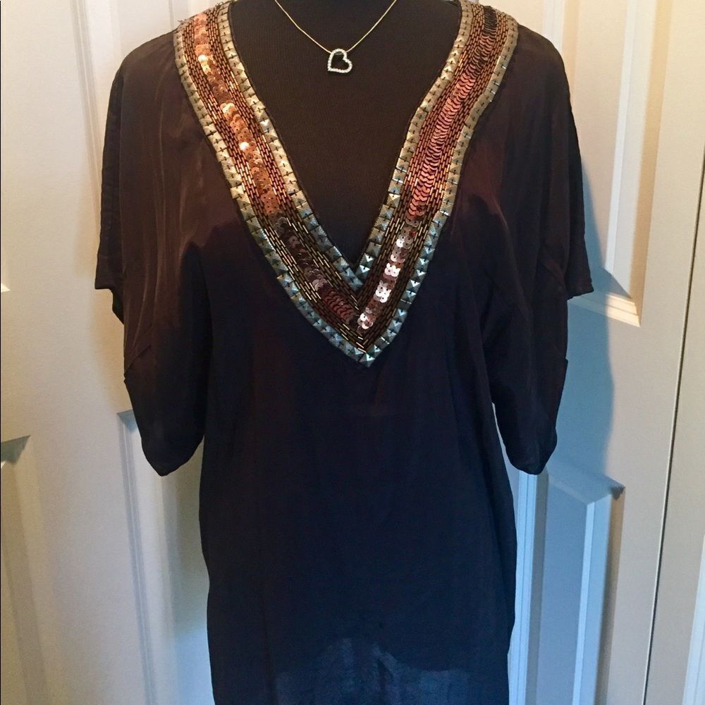 Stunning blouse by Nikibiki in medium